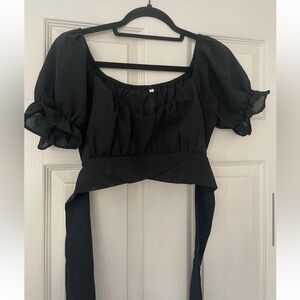 Black tie-top. Never worn. Size Medium from Amazon.